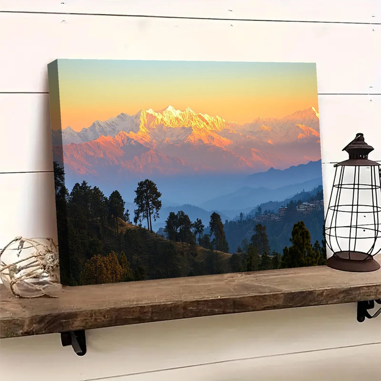 AI generated mountain sunrise wall art showing a glowing mountain range with trees on a wooden shelf