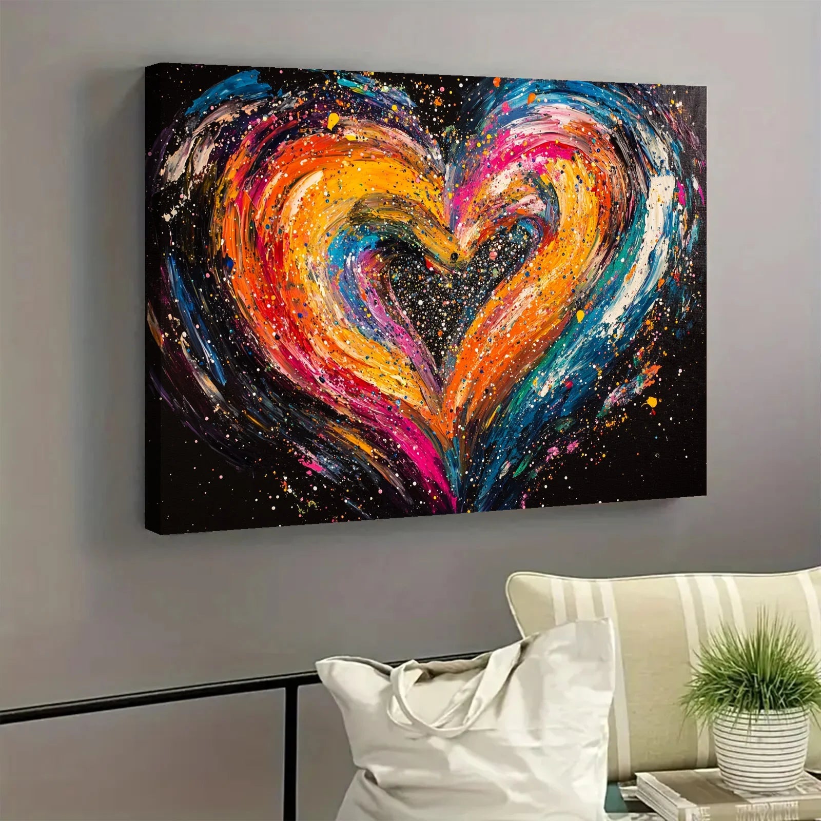 Colorful AI generated heart artwork with vibrant splashes of orange, pink, blue, and yellow on black canvas