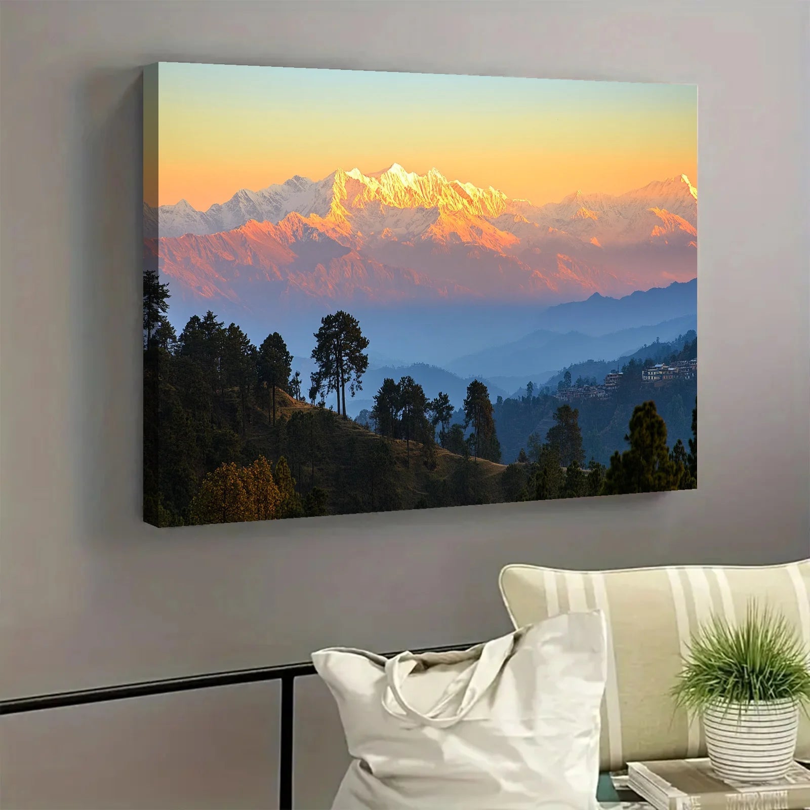 AI generated mountain sunrise wall art showing a vibrant sunrise lighting snowy peaks above forested hills